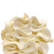 A close up of a white swirly object with a white background.