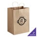 A brown paper bag with handles and a logo that says "Choice" on it.