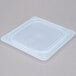 A Cambro translucent plastic lid on a food container.