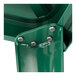 A close-up of a green metal Lancaster Table & Seating bar height table structure.