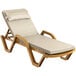 a tan lounge chair with a white cushion