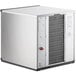 A white rectangular Scotsman water cooled ice machine with a red button.