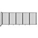 A clear poly wall-mounted room divider with white panels.