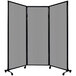 A Versare light gray poly room divider on wheels.