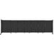 A black rectangular Versare StraightWall sliding room divider with wheels.
