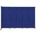 A blue rectangular wall-mounted room divider with black trim and wheels.