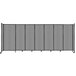 A light gray Versare StraightWall sliding room divider with wheels.