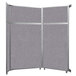 A grey Versare room divider with a metal frame.