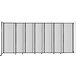 A clear Poly Versare StraightWall wall-mounted room divider.