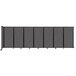 A Versare charcoal gray wall-mounted room divider with four panels.