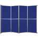 A Versare royal blue folding room divider with silver trim on four metal legs.