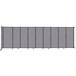 A Versare Cloud Gray StraightWall wall-mounted room divider with black lines on it.