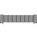 A light gray Versare room divider with five panels on wheels.