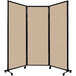 A Versare tan fabric room divider with wheels.