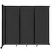A black wall-mounted Versare room divider with four panels.