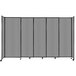 A Versare light gray room divider with wheels.