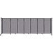 A Versare Cloud Gray StraightWall sliding room divider on wheels.