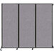 A Versare Cloud Gray wall-mounted room divider with a black frame.