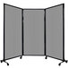 A light gray Versare portable room divider on wheels.