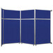 A Versare royal blue folding room divider with silver trim.