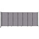 A Versare Cloud Gray StraightWall wall-mounted room divider with sliding doors.