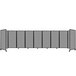 A light gray Versare room divider with black lines on wheels.