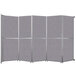 A Versare room divider with cloud gray fabric panels.