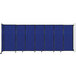 A blue wall-mounted Versare StraightWall room divider with black trim.
