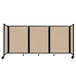 A beige Versare foldable room divider with a black frame.