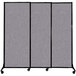 A Versare Cloud Gray Quick-Wall sliding room divider with three panels on wheels.