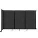A black Versare wall-mounted room divider with four panels.