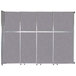 A Versare cloud gray sliding room divider with metal rods.