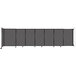A charcoal gray Versare StraightWall room divider with wheels.