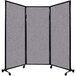 A Versare Cloud Gray Quick-Wall folding room divider with wheels.