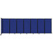 A blue Versare wall-mounted room divider with black trim on four panels.