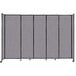 A Versare Cloud Gray StraightWall sliding room divider with black trim.