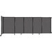 A Versare charcoal gray wall-mounted sliding room divider.