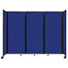A Versare royal blue foldable room divider with black trim on wheels.