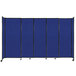 A blue room divider with wheels on the bottom.