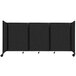 A black Versare SoundSorb folding room divider on wheels.