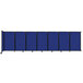 A blue rectangular Versare wall-mounted room divider with a black frame.