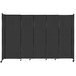 A black Versare StraightWall sliding room divider on wheels.