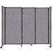 A Versare Cloud Gray StraightWall sliding room divider with wheels.