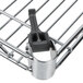 A Metro Super Erecta chrome wire shelf with black clips.