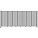 A Versare clear poly room divider with wheels.