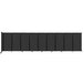 A black wall-mounted Versare room divider with four panels.