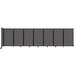 A Versare wall-mounted room divider with grey panels.