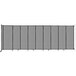 A light grey Versare wall-mounted sliding room divider with black borders.