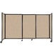 A Versare beige room divider with four panels of tan fabric.