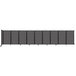 A charcoal gray Versare wall-mounted room divider with four panels.